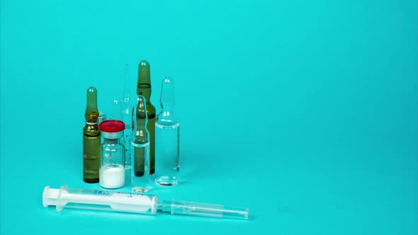 Various Medical Glass Bottle for Vaccination or Treatment. Stop Motion alt