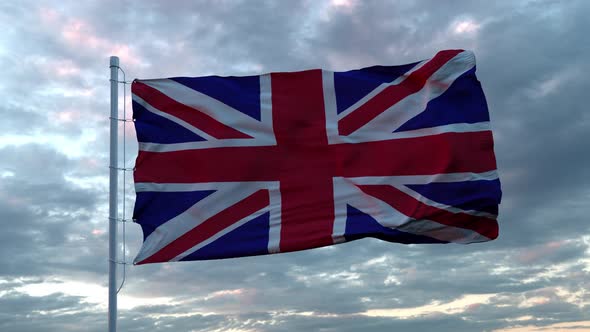 Realistic Flag of United Kingdom Waving in the Wind Against Deep Dramatic Sky. UHD 60 FPS Slow alt