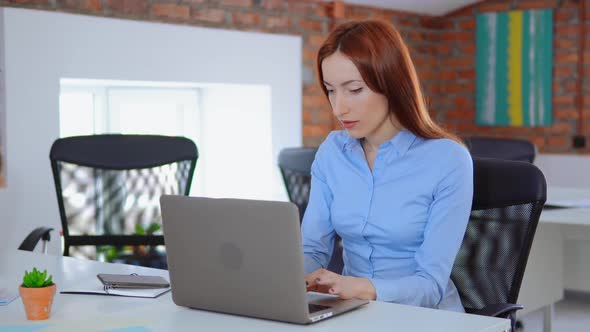 Redheaded Busy Employee alt