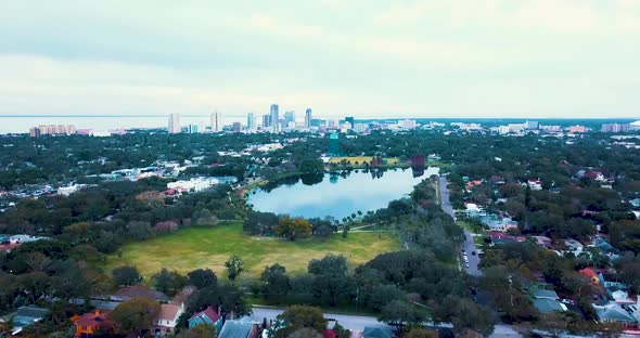 4K Aerial Video Flying Towards Downtown St Petersburg over Crescent Lake Park alt