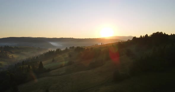 Fog In The Carpathian Mountains. Sunrise Over The Mountains