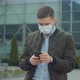 Young Man Wearing Protective Face Mask Use Phone COVID-19 Coronavirus Infection Near Airport - VideoHive Item for Sale