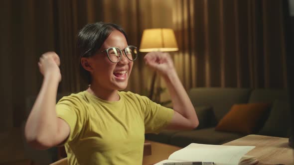 Young Asian Girl Student Celebrating With Computer At Home, Teenage Boy Learning Online alt