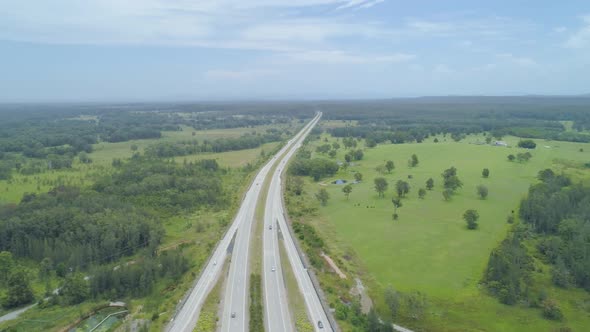 Cinematic Pan Across Cars Driving on Pacific Highway in New South Wales, Australia