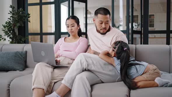 Excited Daughter Wants to Get Attention From Busy Parents alt