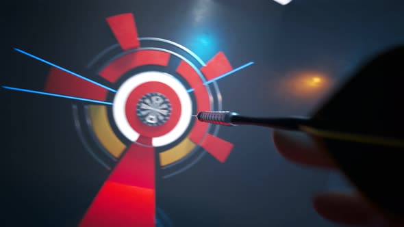 Player throwing a dart hitting perfectly in the bullseye of the dartboard. alt