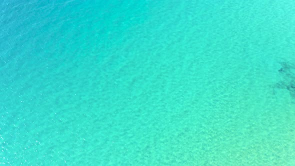 View of transparent and crystal clear water of mediterranean sea in Sardinia, Italy alt