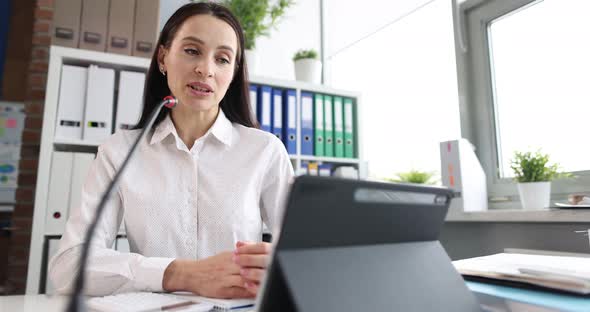Business Consultant Remotely Communicates with Partners Closeup alt