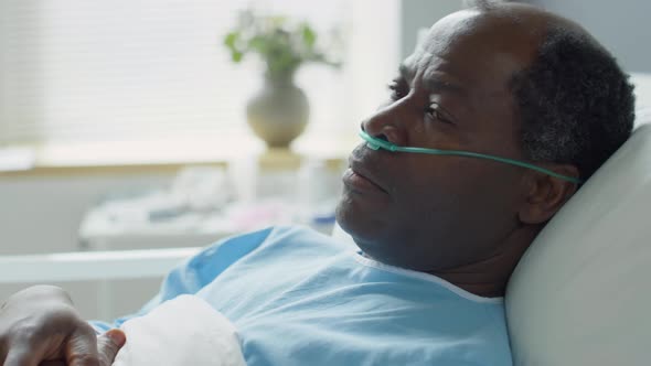 Portrait of African American Hospital Patient with Nasal Cannula, Stock ...