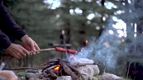 Cooking Sausage On The Campfire