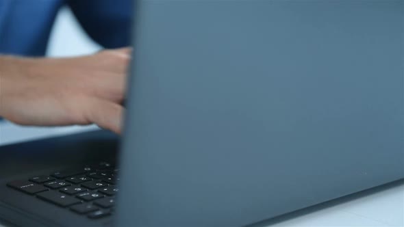 Businessman Hands Typing  On Keyboard Laptop Computer