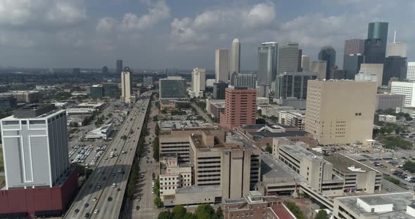 This video is about an establishing aerial shot of downtown Houston skyline on a cloudy day This vid alt
