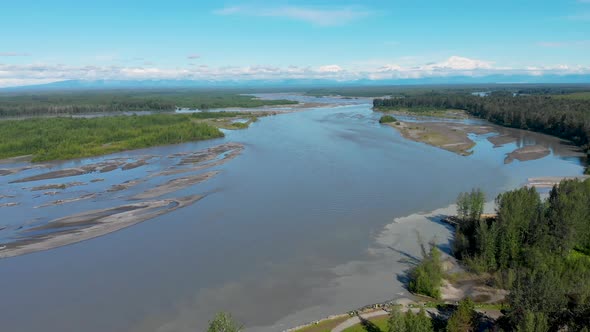 4K Drone Video of Alaska Railroad Train Trestle with Mt. Denali in Distance during Summer alt