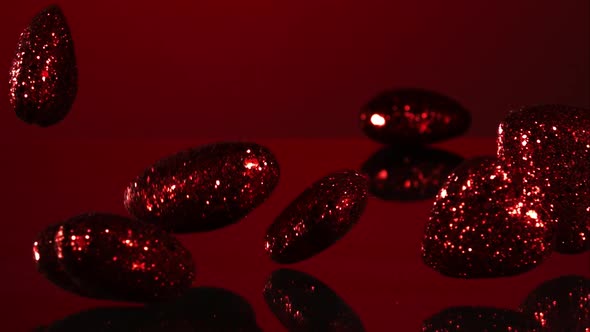 Decorations falling, bouncing in ultra slow mo 1500fps - reflective surface - VALENTINES PHANTOM  alt