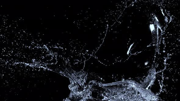 Super Slow Motion Shot of Water Splash at 1000Fps Isolated on Black Background alt