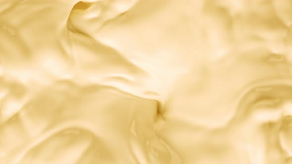 Super Slow Motion Shot of Swirling Yellow Milky Wortex at 1000Fps alt