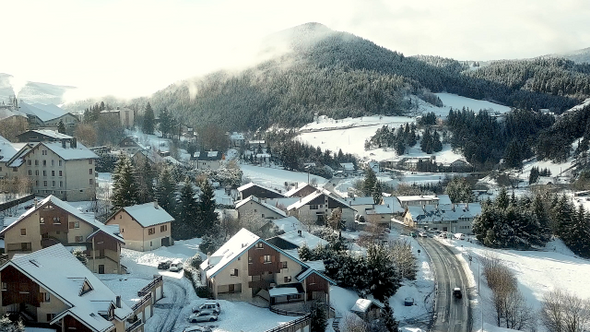 Aerial View Over French Snowy Mountain Town