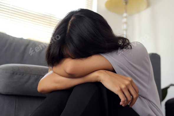 Depression Woman Crying Hug Her Knee While Sitting on The Floor Stock ...