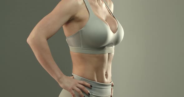 Closeup of Sportswoman Torso in Sports Bra Female Fitness Intructor Showing Abs and Perfect Body alt