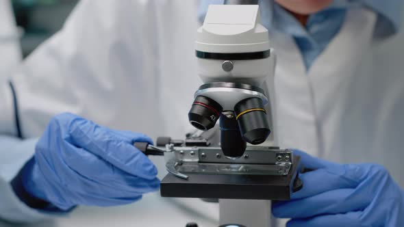 Close Up of Scientific Microscope in Laboratory alt