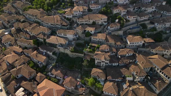 Charming  Ottoman houses  cascade down valley, stone-and-alabaster city of Berat, Albania, High angl alt