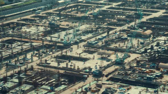 Time Lapse of Construction Site with Heavy Construction Machinery in Metropolis alt