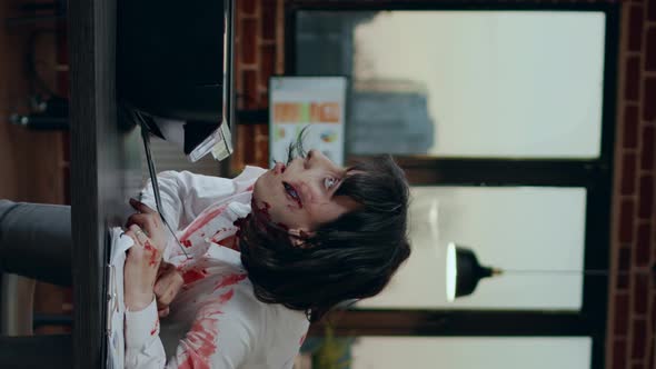Vertical Video Goofy Creepy Zombie Trying to Photocopy Her Own Head in Office alt