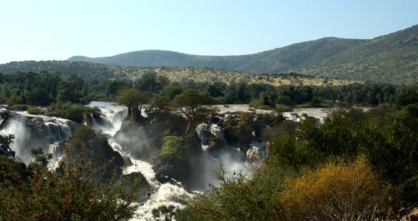 Sunrise in waterfall Epupa Falls, Northern Namibia alt