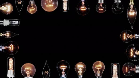 Many Edison Lamps Blinking over Black