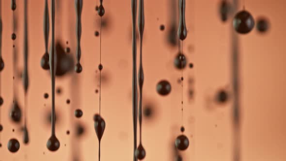 Super Slow Motion Shot of Dripping Melted Chocolate at 1000 Fps. alt