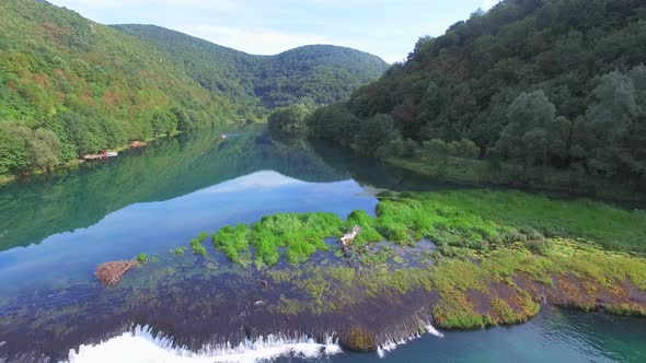 Aerial view of water cascades on Una river in Bosnia alt