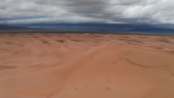 Storm Clouds Over Sand Dunes in the Desert