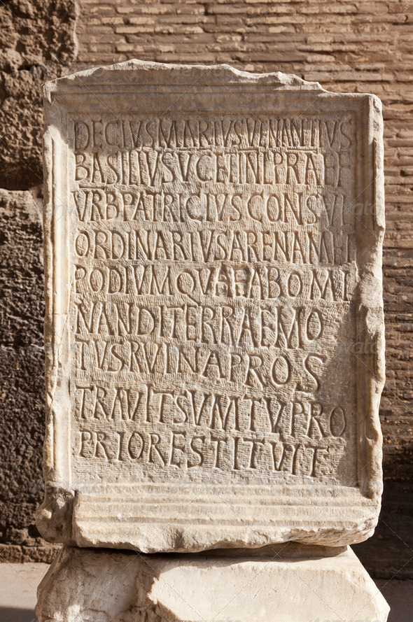 Ancient roman epigraph. Inscription located in Colosseum Arena, Roma, Italy. - Stock Photo - Images