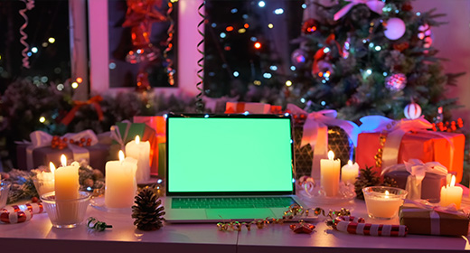 Christmas background with devices with Chroma Key on the screen