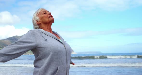 Senior woman performing yoga alt