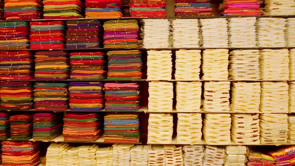 Sari Shop. Indian Traditional Women's Sari clothing on Market. Buying Wedding Sari in India