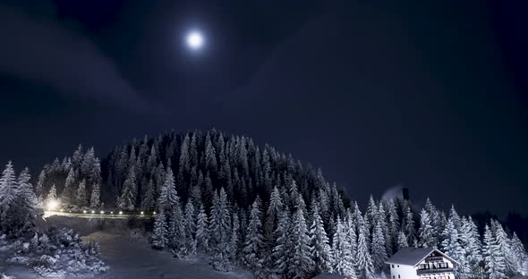 Snowy Mountain Landscape With Bright Full Moon On A Winter Night - Night Lapse alt