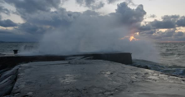 Waves Crashing to the Pier Water Spray Cascade Slow Motion