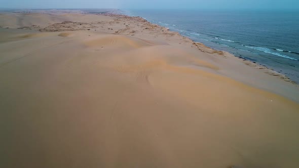 Flying Above Sand Sea Beach