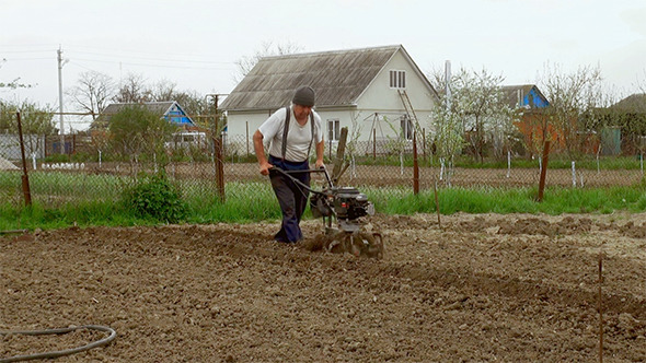 Working Man With Motor Cultivator (Life Sound)