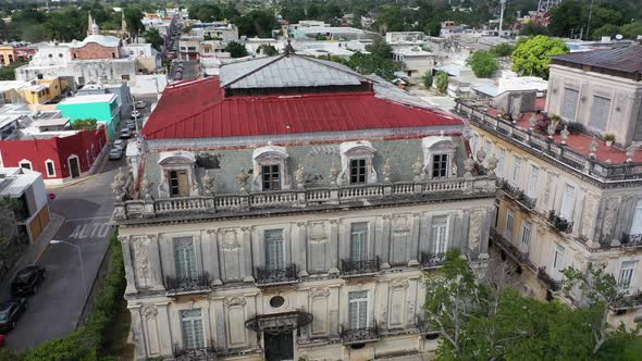 Aerial trucking to left with turn at end of the Casa Gemalas, twin houses on the Paseo Montejo in Me alt