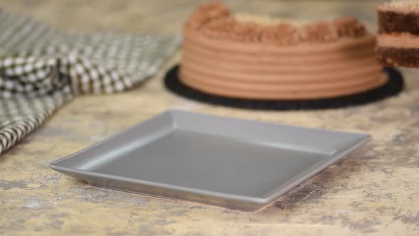 Piece of Delicious Chocolate Cake with Nuts and Caramel