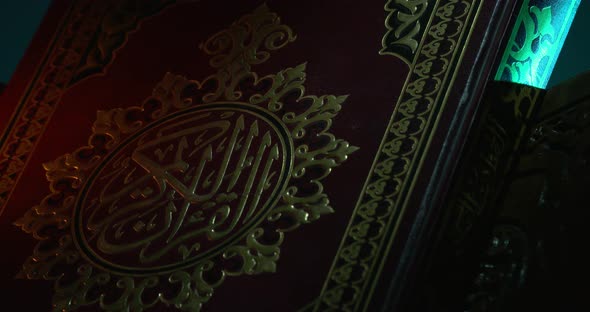 Holy Quran Cover On Book Rest With Prayer Beads alt