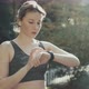Fitness Woman In Airpods Using Smartwatch - VideoHive Item for Sale