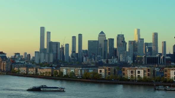 Canary Wharf and River Thames in London at sunset. Business and banking district alt