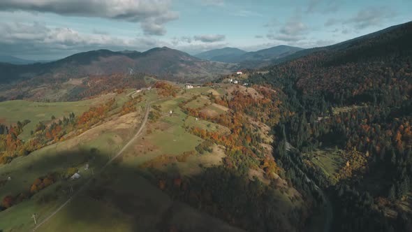 Picturesque Hilly Landscape with Mixed Brown Green Forests alt