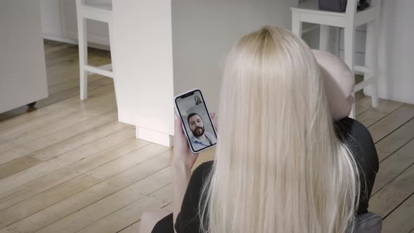 Mother with baby son have video chat alt