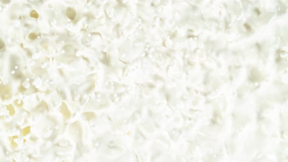 Super Slow Motion Shot of Swirling Fresh Cream at 1000Fps alt