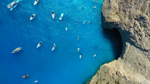 Yacht and boat on the water surface from top view. Turquoise water background from top view. alt