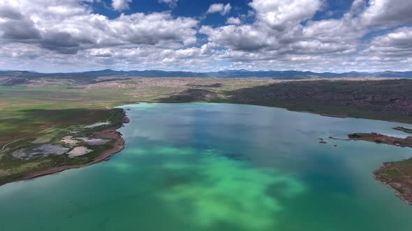 Spectacular Turquoise Blue Green Lake Waters On Plain In Low Hilly Terrain Geography alt